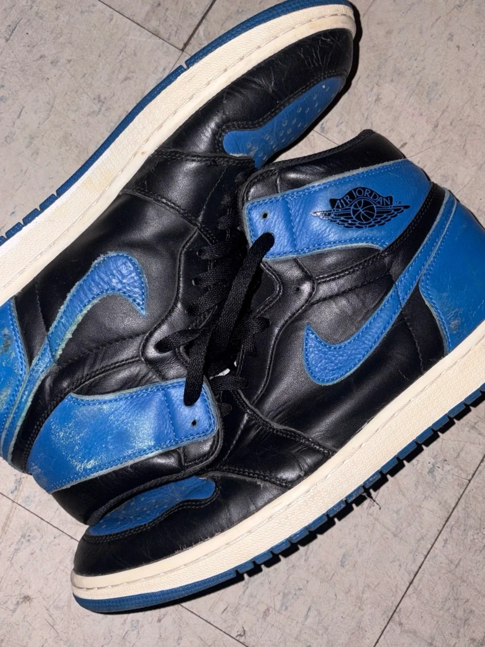 Jordan Men’s High-Top Sneakers in Black and Blue